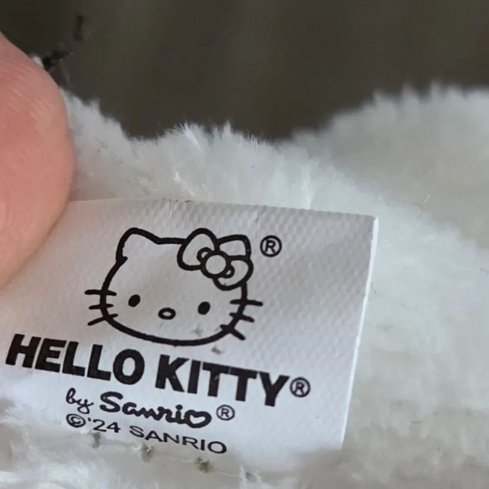 The Crème Shop Plush Spa Headband with Hello Kitty's Signature Bow (Pink)